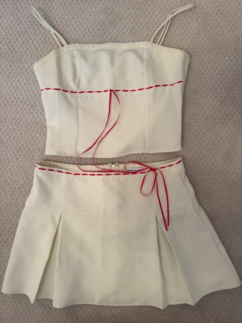 Selfie Leslie Two-Piece Crop Top and Pleated Skirt Set with Red Trim